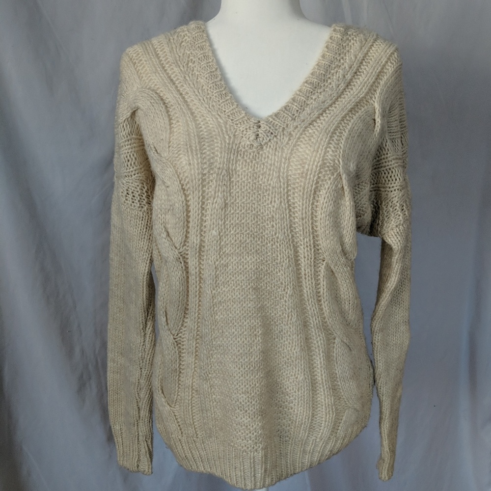 Off-white V-neck knit sweater